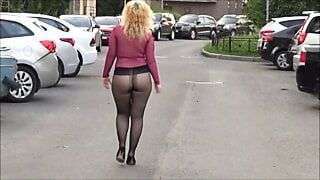 Hot blonde with big booty on the street