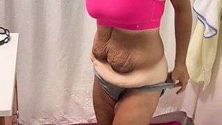 Mature woman undressing and spreading ass and playing with her boobs