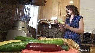 MILF washes a cucumber and ends up masturbating with it