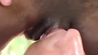 Slutty redhead licking large African clit, yummy
