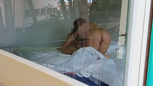 I caught my hot milf neighbor giving a blowjob in front of the open window, she’s so good at making a cock hard
