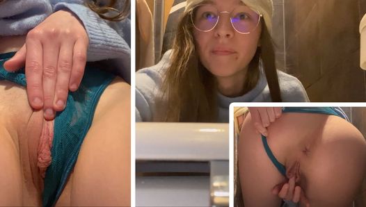 Teen fucks herself in public toilette at the Cinema