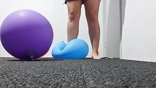 Women Popping balloons, stomping on balloons