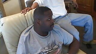 Busty black MILF can handle two huge black sticks at the same time