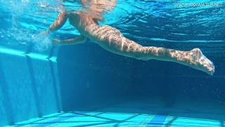 Sexy Russian milf Kalisy masturbating by the pool