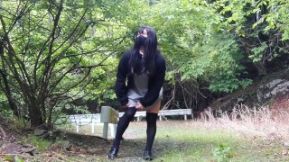 Transgender and urinated outdoors on an abandoned road