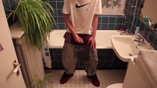 Young guy peeing himself